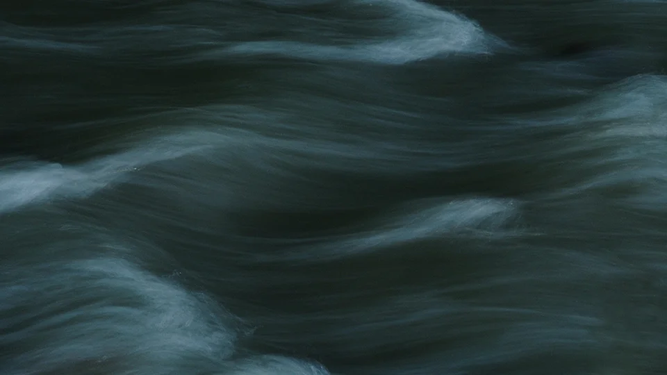 Operational streamflow forecasting with theory-guided deep learning